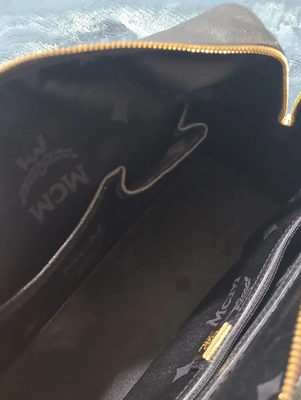 MCM Black Leather Bag with Gold Logo Plate
